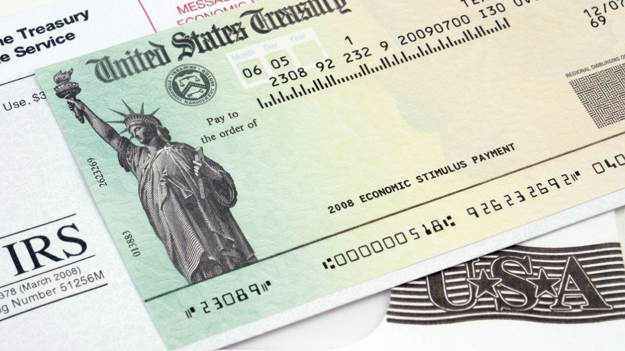 A person checking their IRS refund status on a smartphone for May 2026.